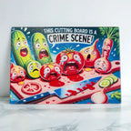 A humorous cartoon design of a vegetable crime scene with scared and crying vegetables chopping board from Laser Design Creations