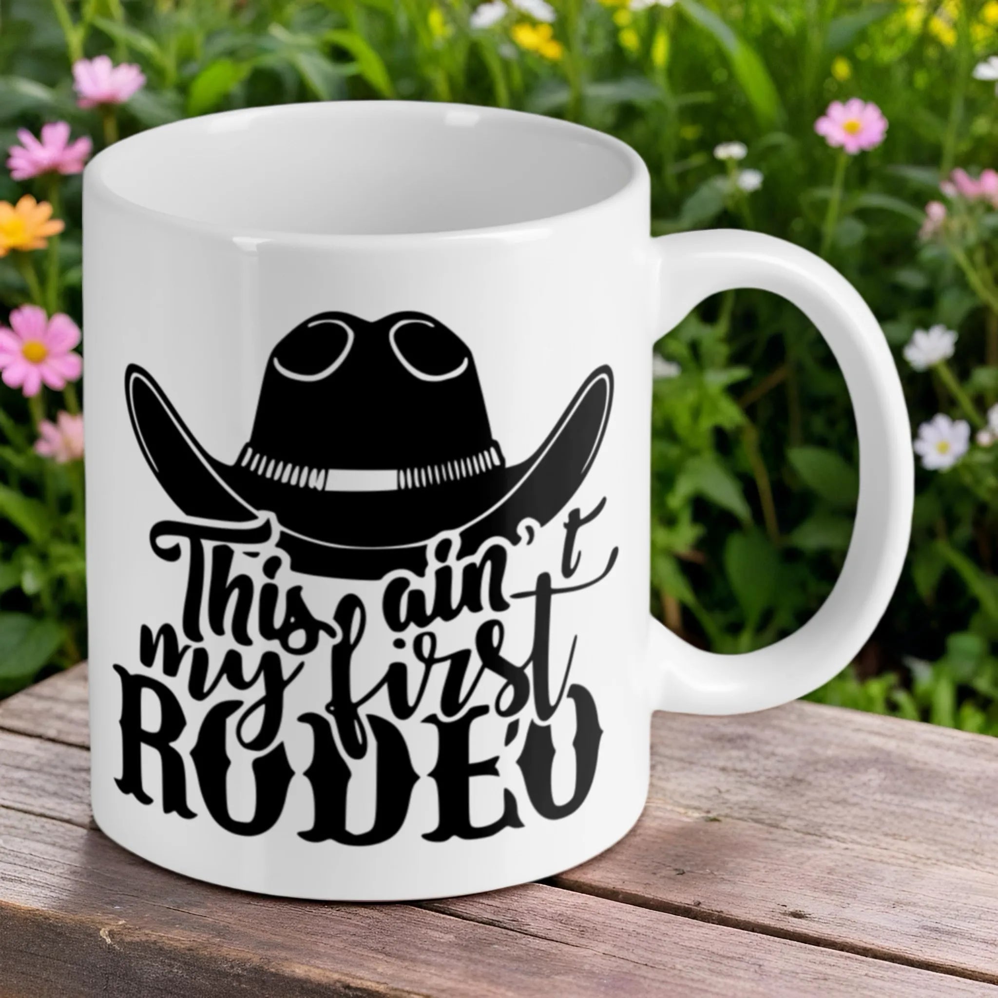 Reverse side of "This ain't my first rodeo" ceramic mug, showcasing the wrap-around artwork by Laser Design Creations.