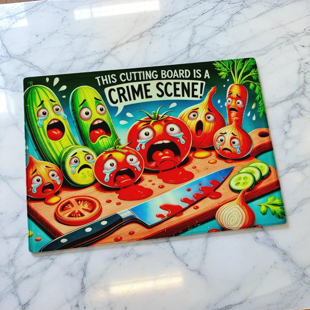 Scared Crying Vegetables Crime Scene chopping board by Laser Design Creations, featuring a quirky, dark humour illustration of cartoon vegetables in a mock crime scene on a cutting board surface. Displayed on a marble countertop.