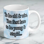 Reverse side of Old And Wise Quote 11oz ceramic mug, showcasing humorous nostalgic text and elegant typography by Laser Design Creations.