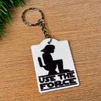 Side view of Use The Force Toilet Silhouette keyring, showcasing a hilarious toilet silhouette graphic on a solid background by Laser Design Creations.