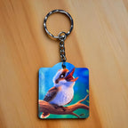 Vibrant Kookaburra on Branch Acrylic Keyring by Laser Design Creations, featuring a charming, laughing kookaburra illustration perched on a branch.