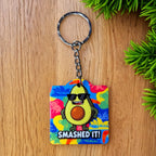Vibrant SMASHED IT! Keyring by Laser Design Creations, featuring a cool, triumphant avocado cartoon celebrating success.