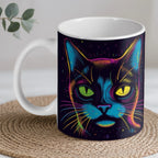 Vibrant Green-Eyed Cat ceramic mug by Laser Design Creations, featuring a striking, front-facing feline face with large green eyes in shades of blue and teal.