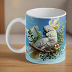 Watercolour Sulphur Crested Cockatoo ceramic mug by Laser Design Creations, featuring an illustrated white bird with a bright yellow crest on an artistic backdrop.