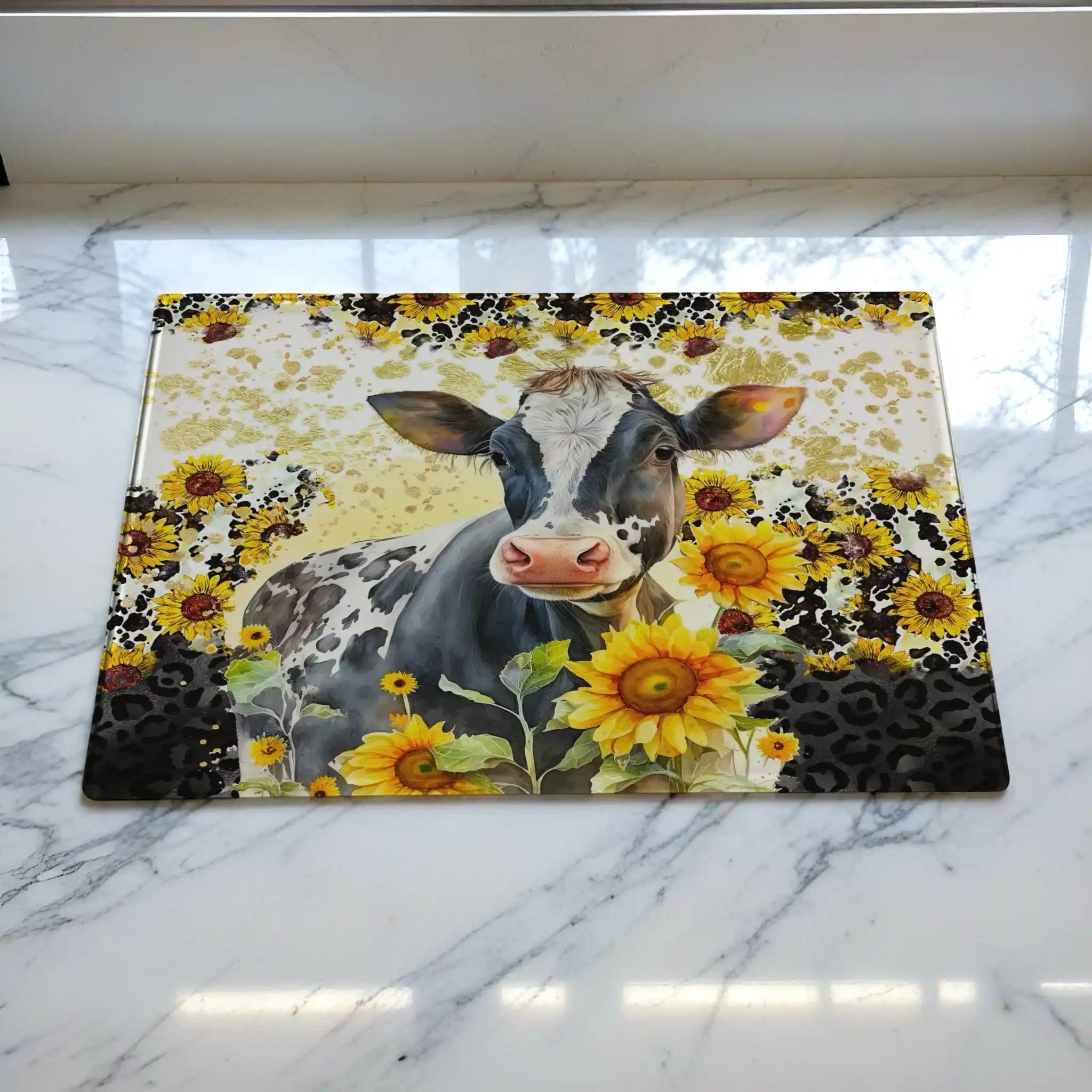 Watercolour Cow & Sunflower chopping board by Laser Design Creations, featuring a charming farmhouse cow surrounded by sunflowers against a bold leopard print background.