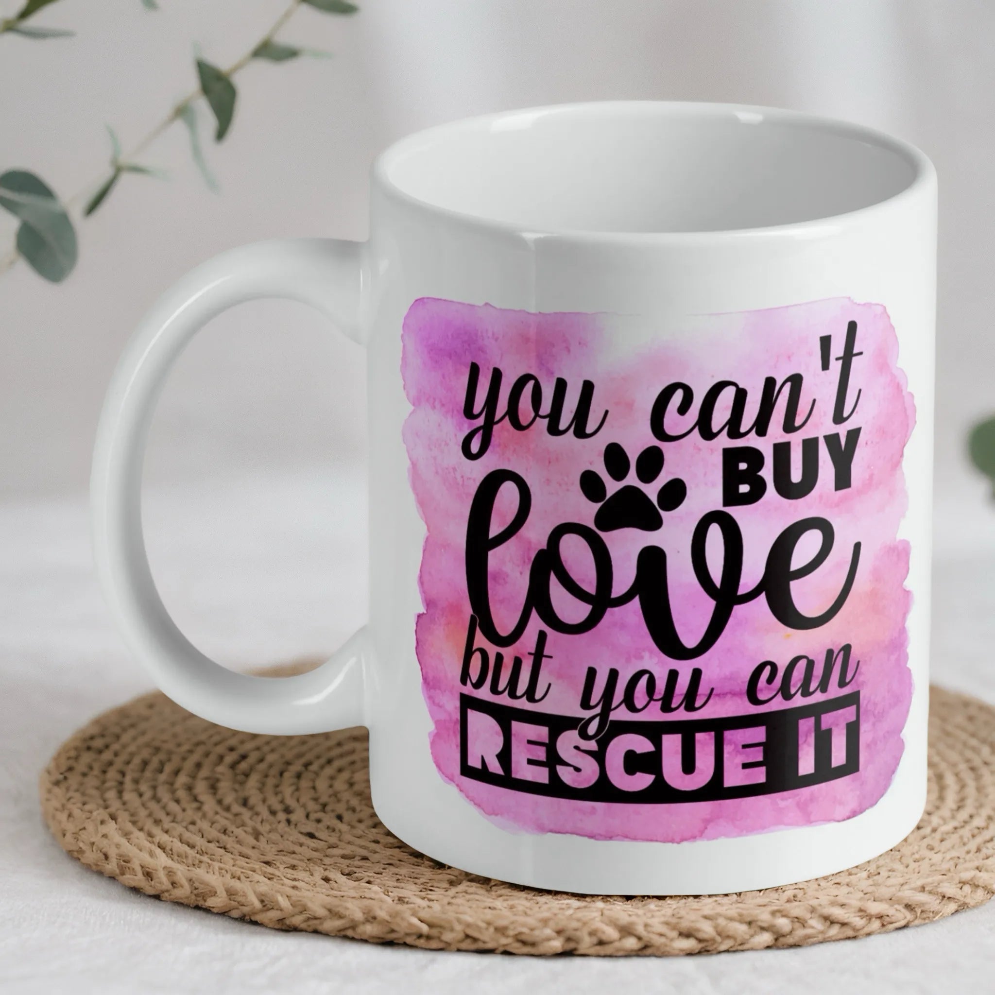 You Can't Buy Love quote ceramic mug by Laser Design Creations, featuring a heartfelt pet rescue message on a pink watercolour background.