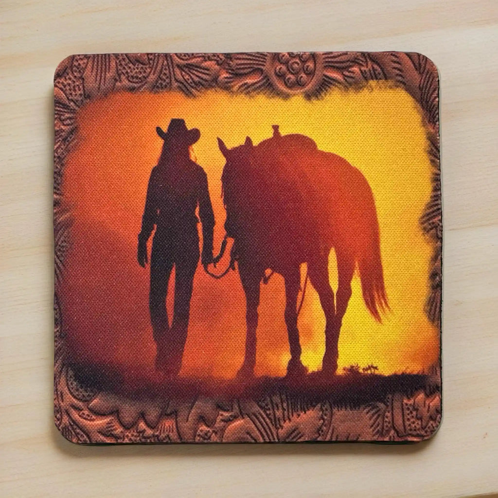 Top view of a set of four Western Cowgirl neoprene coasters with a country western silhouette scene, by Laser Design Creations.