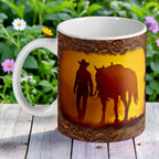 Western Cowgirl Sunset Journey ceramic mug by Laser Design Creations, with a silhouette of a cowgirl and horse against a sunset.