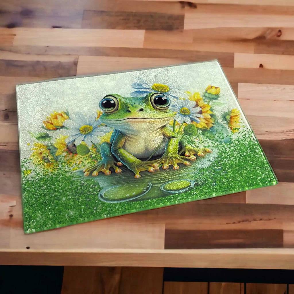 Whimsical Frog & Daisy Art chopping board by Laser Design Creations, featuring a highly detailed illustration of a charming frog amongst lush daisies and vibrant garden flowers.