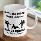 Lifestyle image of the 'My Wife is Expensive' coffee mugs on a desk, printed by Australian small business Laser Design Creations.