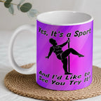 Yes It's A Sport Pole Dancing ceramic mug by Laser Design Creations, featuring a humorous silhouette of a pole fitness dancer against a vibrant purple backdrop with the quote Yes, It's a Sport And I'd Like to See You Try It!.