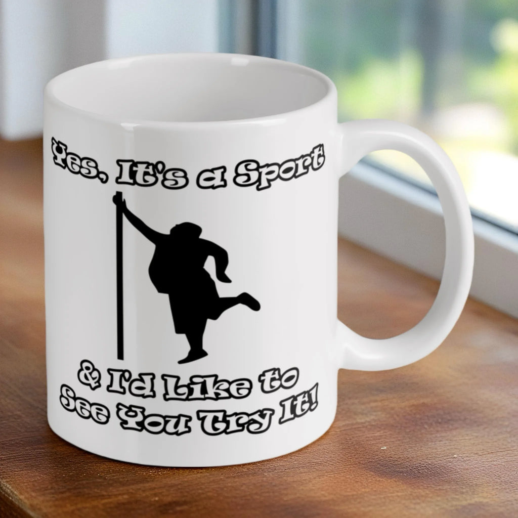 Reverse side of the 'Yes, It's a Sport & I'd Like to See You Try It!' ceramic mug, showcasing the wrap-around artwork by Laser Design Creations.