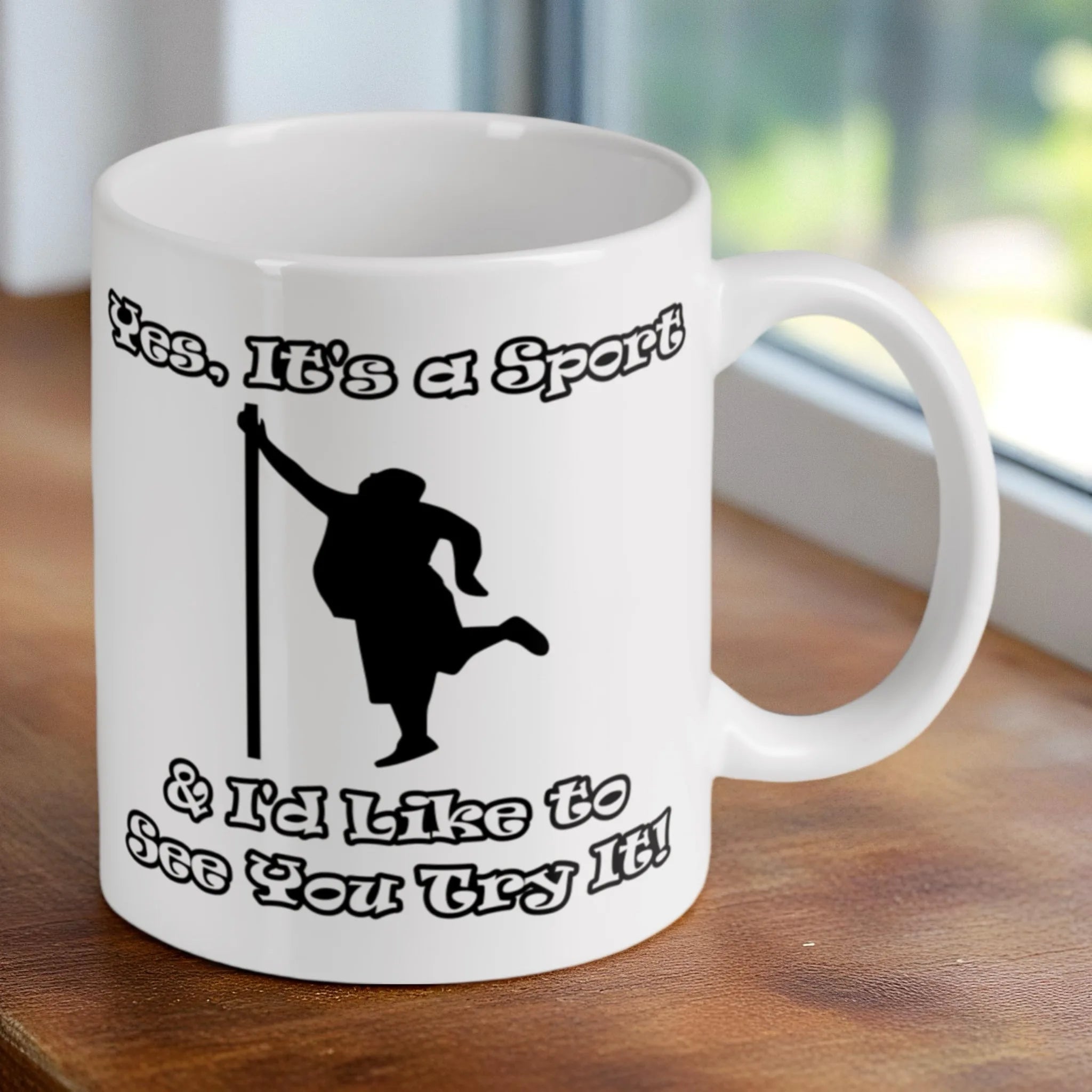 Reverse side of the 'Yes, It's a Sport & I'd Like to See You Try It!' ceramic mug, showcasing the wrap-around artwork by Laser Design Creations.