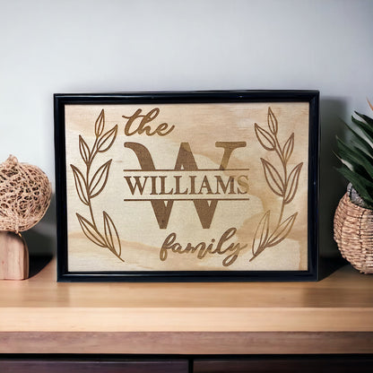 Family name welcome sign wood engraved and displayed on timber table, personalised entryway wall art, Laser Design Creations, Australia.